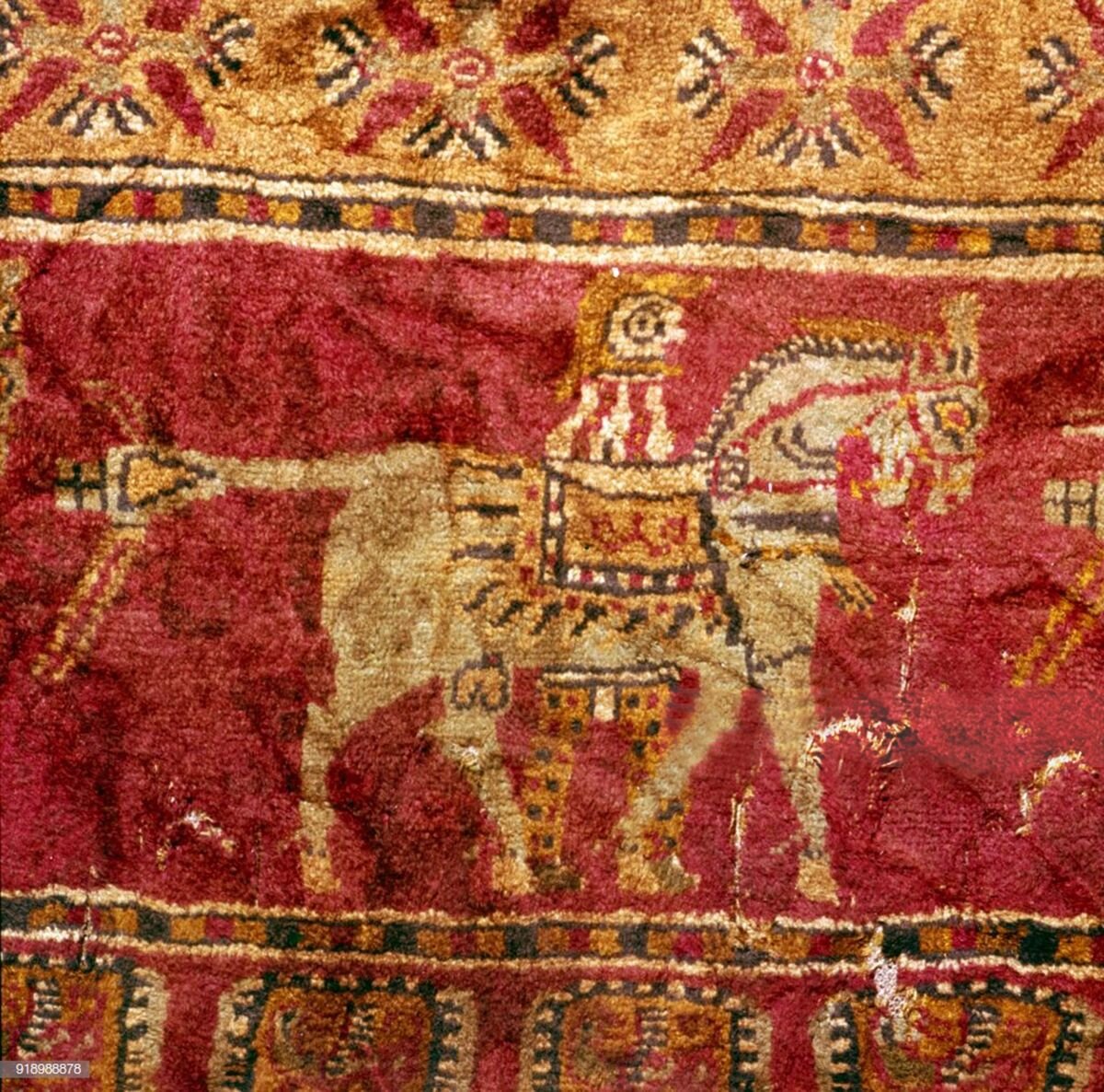 Horseman on the original Pazyryk pile: knotted tail, cropped mane, felt shabrak